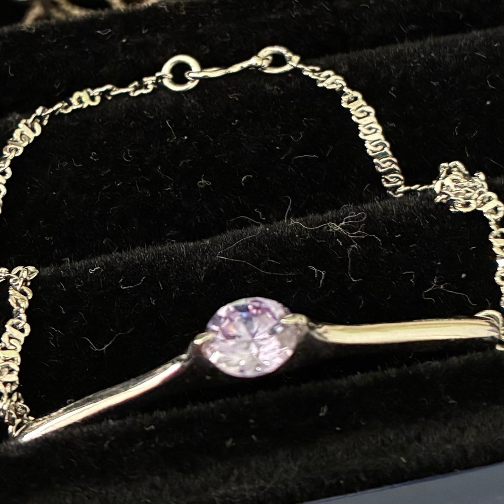 Elegant Silver Bracelet with Purple Gemstone